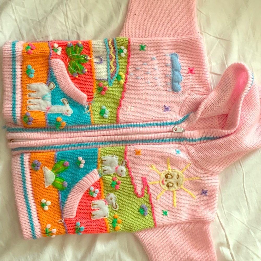 Very cute, hand made cardigan. Fits a 2T